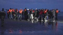 BBC crew sees people struggling on board migrant boat