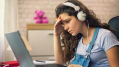 girl looking at laptop