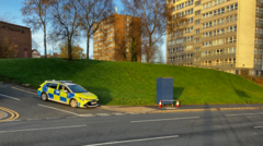 Man charged with murder after body found in flat