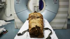The mummified body of Nesyamun laid on the couch to be CT scanned at Leeds General Infirmary