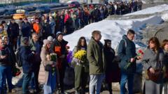 Navalny mourners form long queue to lay flowers