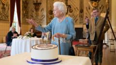 Queen Elizabeth II with celebration cake