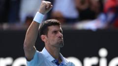 Australian Open semis: Djokovic saves match point and wins third set