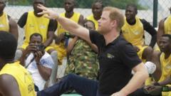 Harry plays sitting volleyball on Nigeria visit