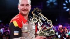 Van den Bergh beats Humphries to win UK Open