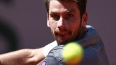 French Open: Norrie breaks back in fifth, Djokovic leads - radio & text
