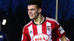 Cox returns to Exeter City 'as a man' after loan