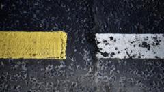 A change in road markings and tarmac designates the border between the Republic of Ireland (L) and Northern Ireland (R) on the A13 Road near Londonderry in Britain 01 March 2019 (reissued 15 March 2021).