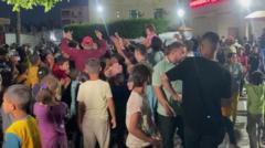 Gazans celebrate after Hamas says it accepts ceasefire