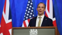 Dominic Raab at a press conference with Antony Blinken