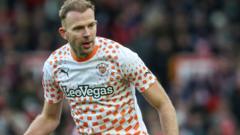 Striker Rhodes to remain on loan at Blackpool