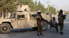 Taliban patrol outside Kabul airport