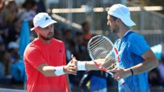 Britons Cash and Glasspool through in men’s doubles