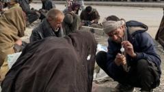 Men gathered on the side of the road in the capital, Kabul to use drugs