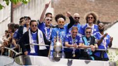 Leicester City fans line streets for champions