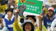 South Korean protesters participate in a rally against the Japanese government's plan to dump radioactive wastewater from the damaged Fukushima nuclear power plant into the Pacific Ocean, on August 12, 2023 in Seoul, South Korea.