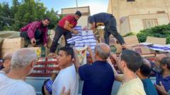 Aid being handed out in Derna, Libya
