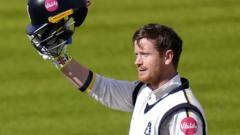 Davies ton puts Warwickshire on top over Hampshire