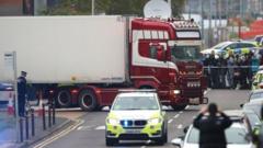 Lorry container being moved under police escort