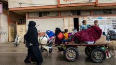 Gazans begin leaving Rafah after Israel tells 100,000 to evacuate