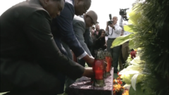 Африканские лидеры возлагают цветы на мемориале в Буче