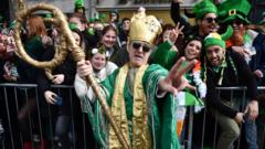 A man in fancy dress poses for a photo as Dubliners celebrate St Patrick's Day on March 17, 2022 in Dublin, Ireland. St Patrick's Day celebrations return to the streets of Dublin after a two-year absence, due to the Covid-19 pandemic.