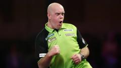 Van Gerwen sets up Dobey semi-final at Worlds