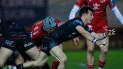 Glasgow brush past Scarlets with Rowe hat-trick