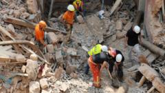 Rescuers search through debris in Beirut on 04 September