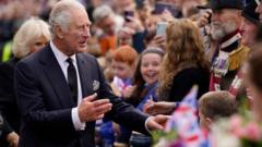 King Charles greets crowds during a visit to Northern Ireland on 13 September