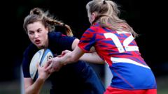 Girls playing rugby union