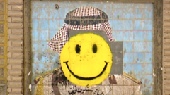 Разрисованный граффити портрет Саддама Хусейна