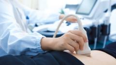 Stock image of doctor carrying out an ultrasound