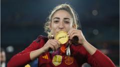 Olga Carmona celebrates for Spain