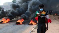 सैन्य कू को विरोधमा प्रदर्शनकारीहरूले राजधानी खार्तुममा टायर बालेर सडकमा अवरोध पुर्‍याएका छन्