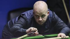 Brecel number one hopes halted by Ding defeat