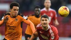 Wolves winger Helder Costa (left) opened the scoring in the first half