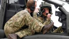 Prince William flies Apache helicopter at handover ceremony