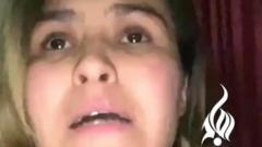 Tamana Zaryabi Paryani em vídeo, com olhar preocupado