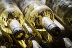 Wine bottles covered in mud