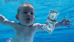The artwork for Nirvana's Nevermind featuring Spencer Elden swimming as a baby