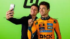 F1 champion Lando Norris meets his waxwork figure