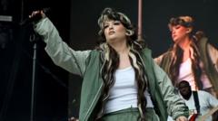 Lola Young 'doing OK' after collapsing on stage during gig