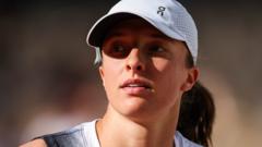 Swiatek not focused on records as title defence continues