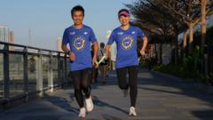 香港视障马拉松跑手傅提芬（Inti）和领跑员丈夫劳超杰（Chris）