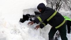 Pakistan"s Rescue 1122 personnel take part in the rescue efforts in the heavy snowfall-hit area in Murree, Pakistan, 09 January 2022