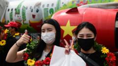Du khách Hàn Quốc đến sân bay quốc tế Phú Quốc vào ngày 20 tháng 11 năm 2021 theo chương trình thí điểm hộ chiếu vaccine