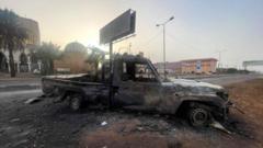 Сожженный автомобиль в Хартуме