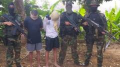 Two "mercenaries" the Venezuelan military says it captured