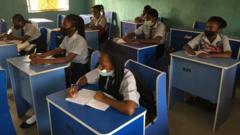 Students in Abuja sit in classroom as schools resume